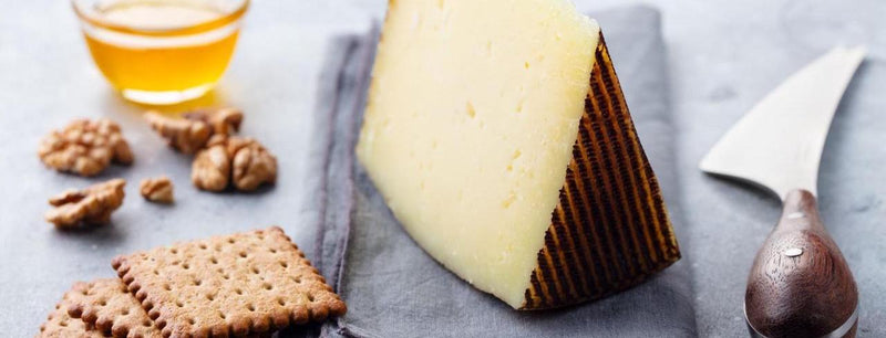 Manchego Cheese Slice and Wine