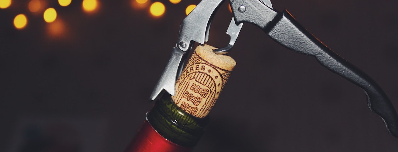 Opening a Wine Bottle with Wine Opener