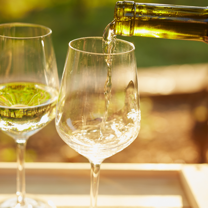 Pouring Viognier into a glass. 