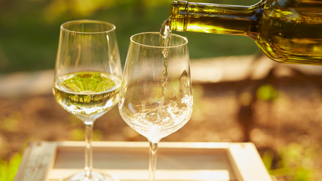 Pouring Viognier into a glass. 