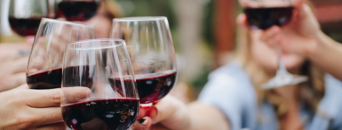 Red Wine Glasses Cheers at Wine Tasting